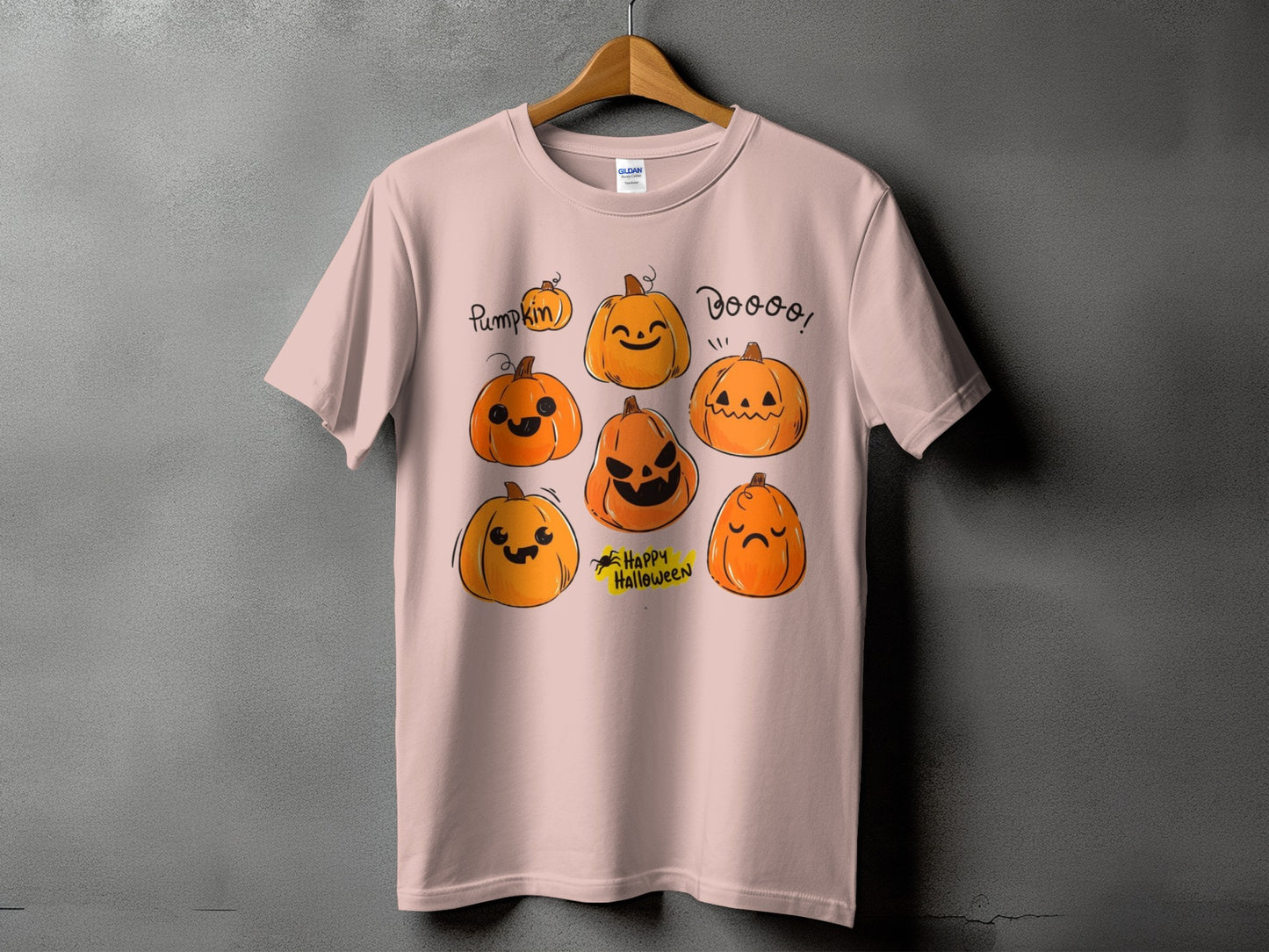 Pink t-shirt with seven cartoon pumpkins and text saying "Pumpkin" and "Dooo!".