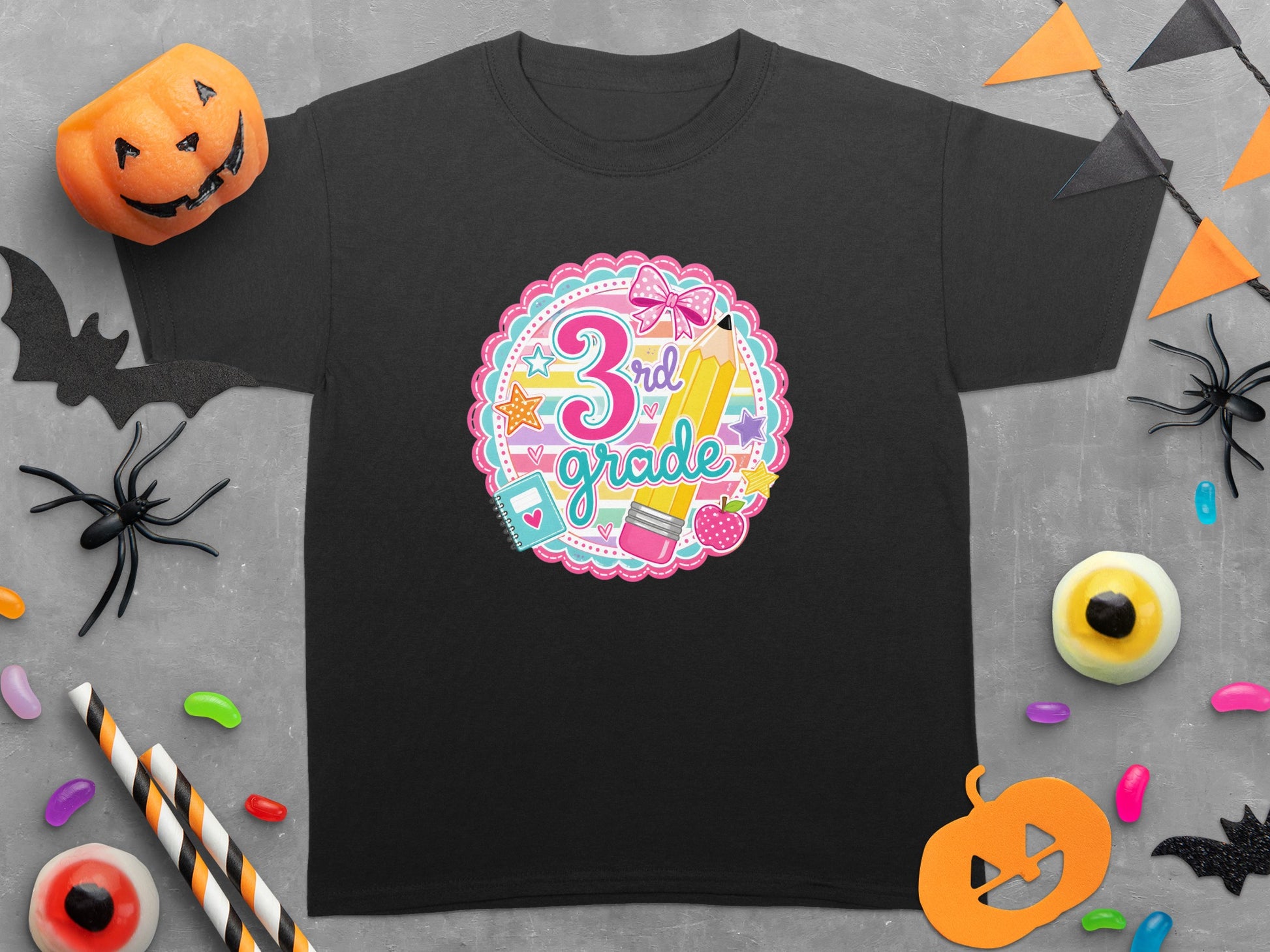 Black t-shirt with "3rd grade" graphic featuring a pencil, bow, and school supplies.