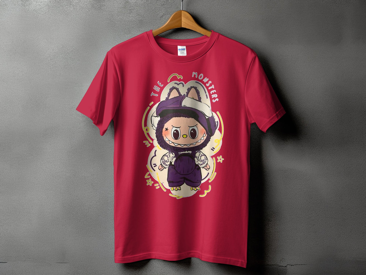 Red t-shirt with a cartoon monster graphic and the text "THE MONSTERS".