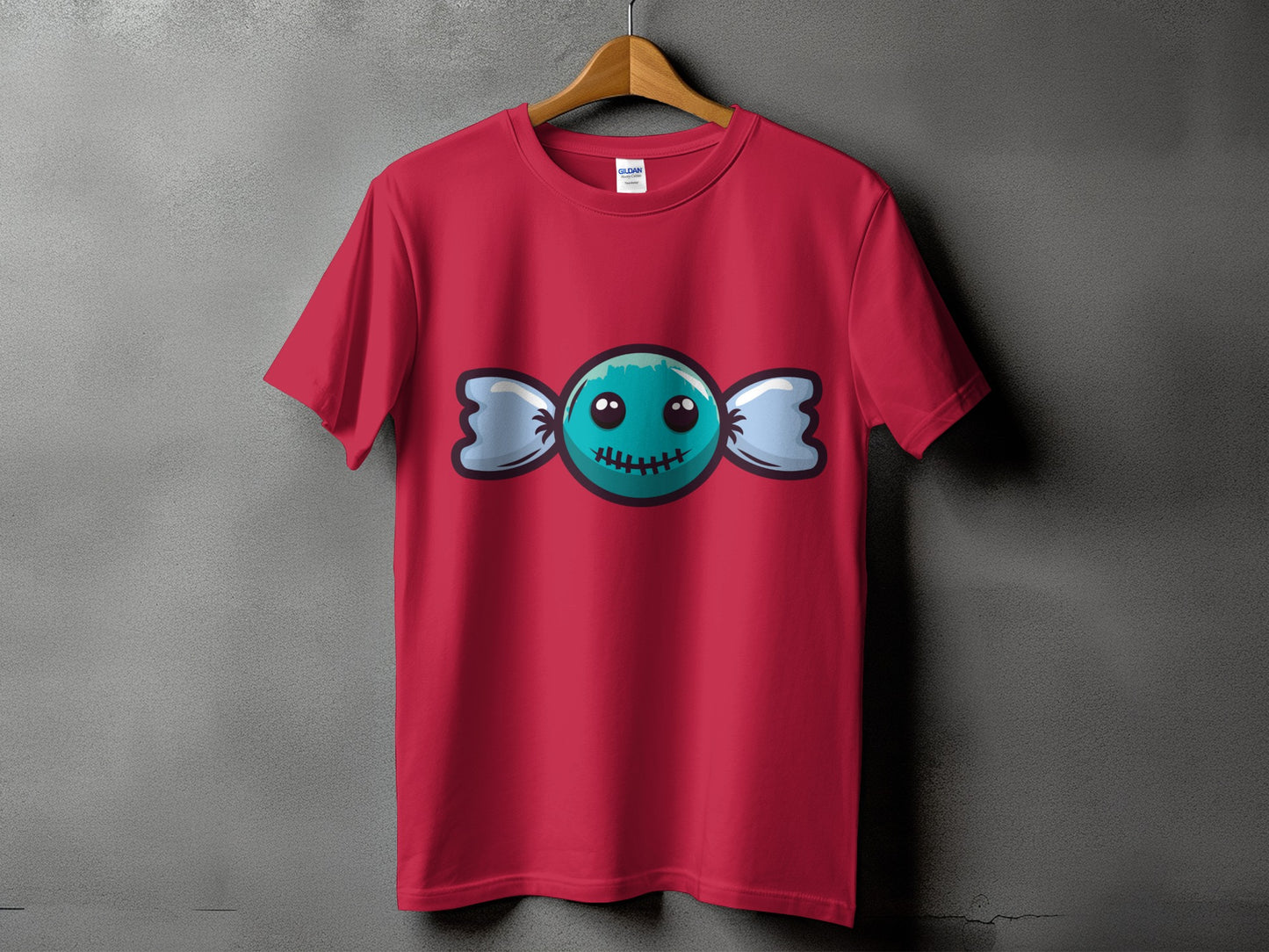 Red t-shirt with a blue candy character wearing a stitched mouth.