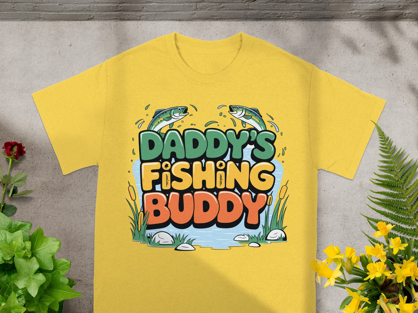 Yellow t-shirt with "Daddy's Fishing Buddy" text and cartoon fish.