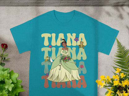 Tiana wearing a green gown with "Tiana" text and flowers.