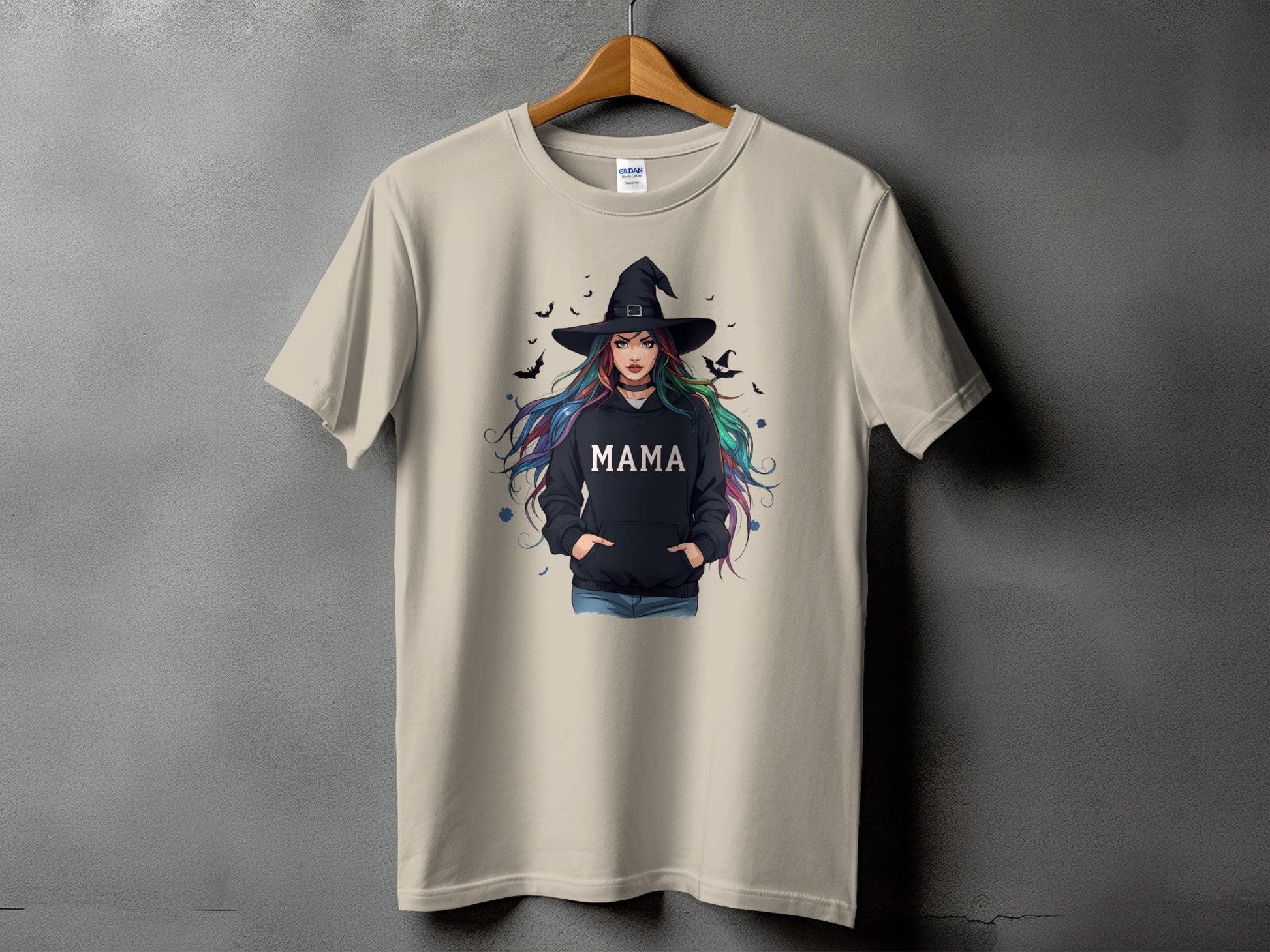 T-shirt with witch graphic and "MAMA" text on a black hoodie.