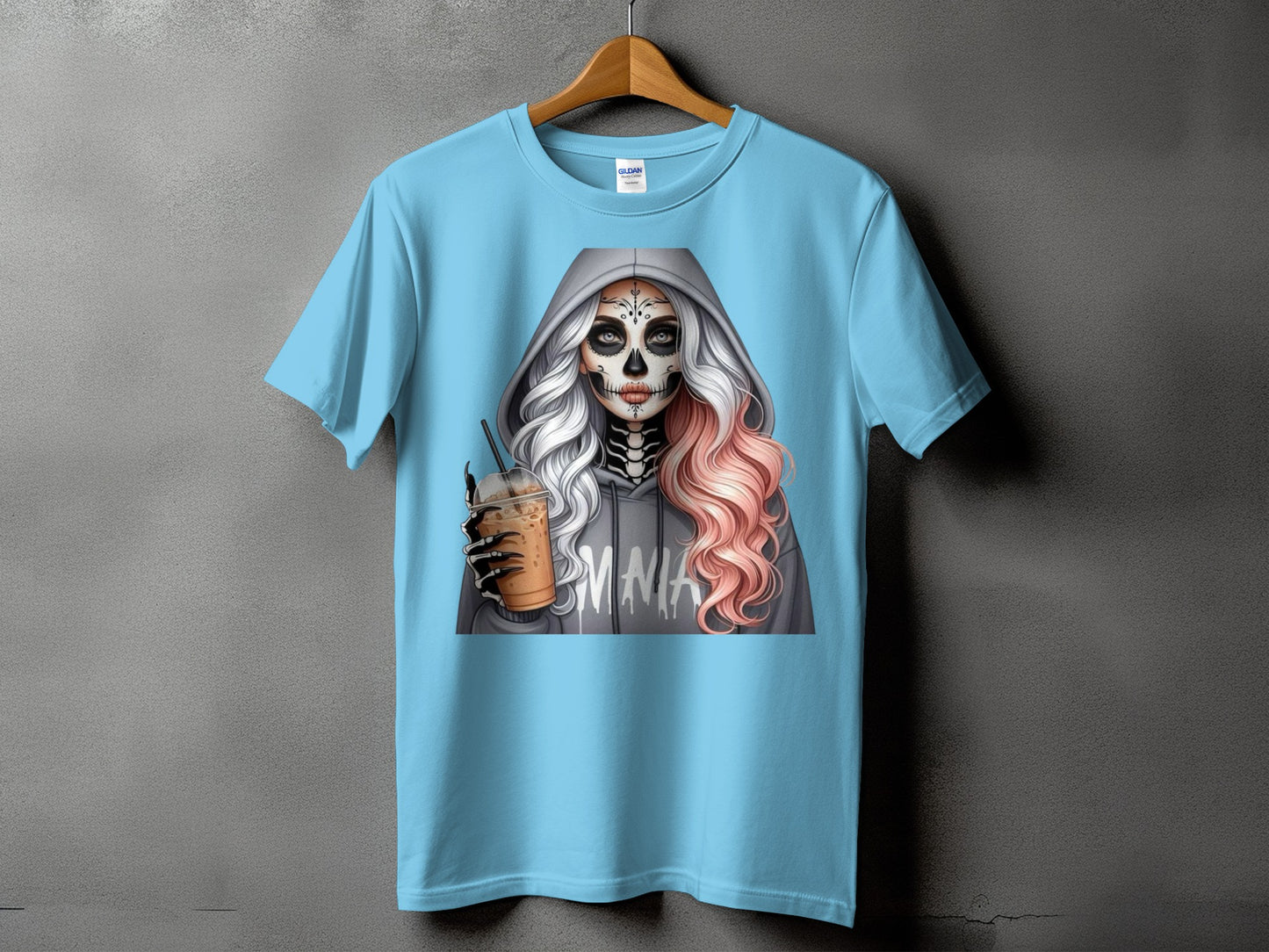 Light blue t-shirt with skeleton woman graphic holding iced coffee, "MMIA" text.