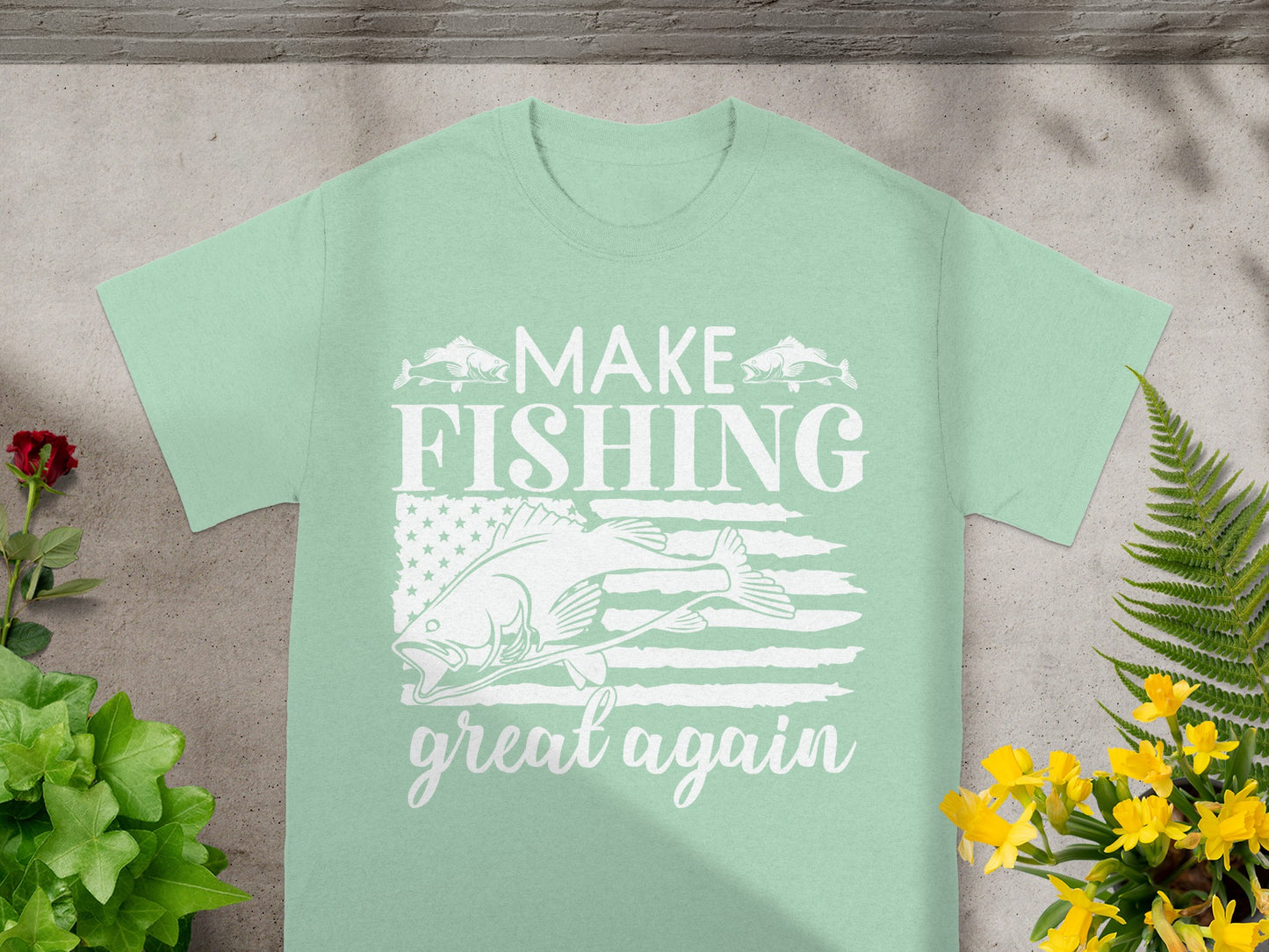 Mint t-shirt with white text and graphic of a fish over an American flag.