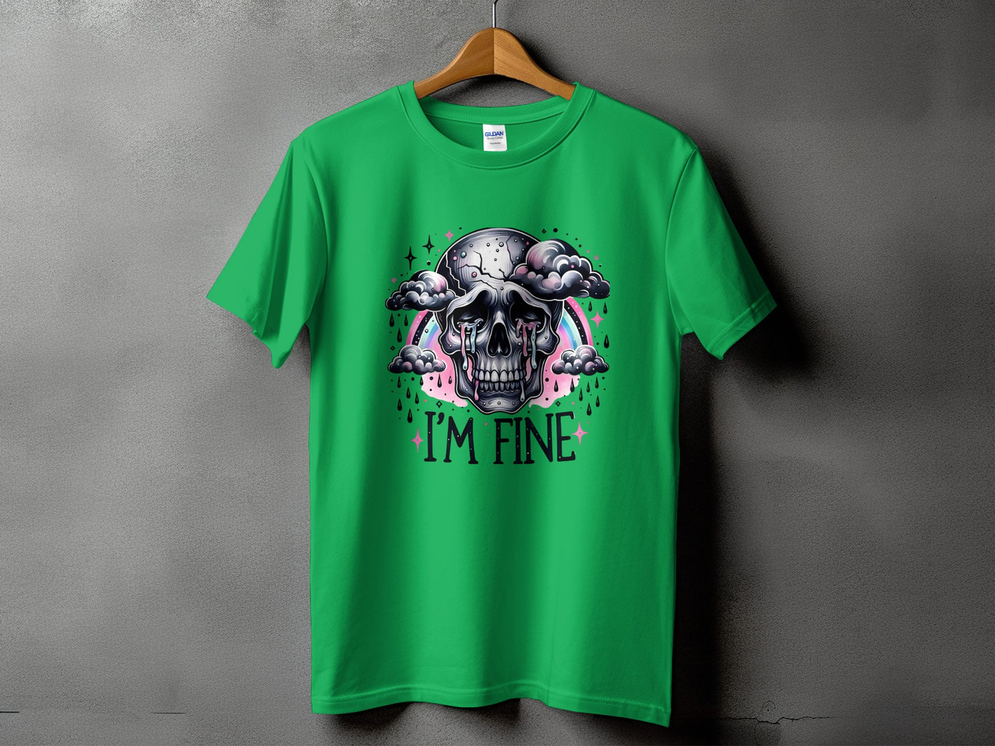 Green t-shirt with a skull crying with clouds, rainbow, and "I'M FINE" text.