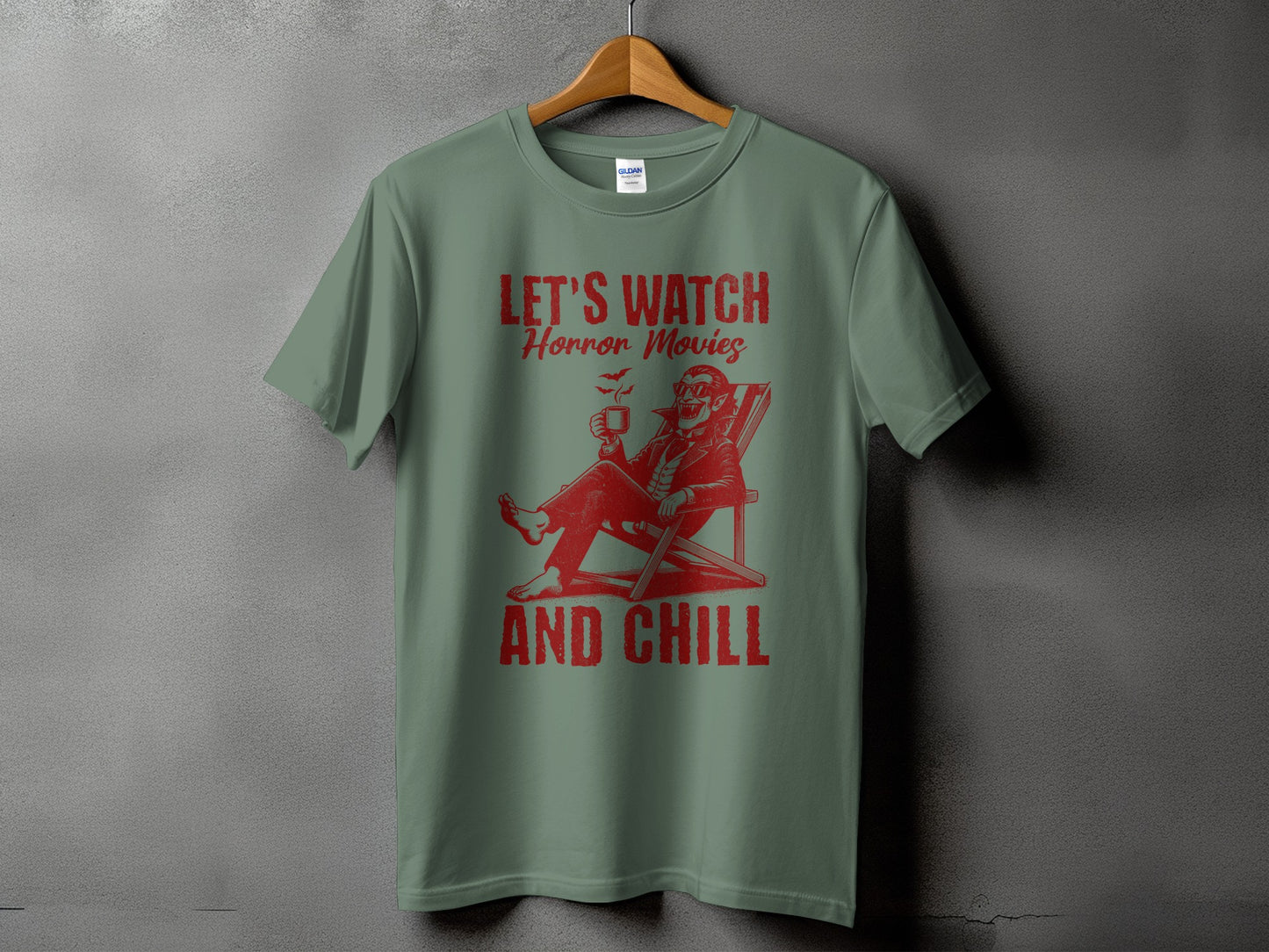 Green t-shirt with red graphic: "LET'S WATCH Horror Movies" and "AND CHILL."