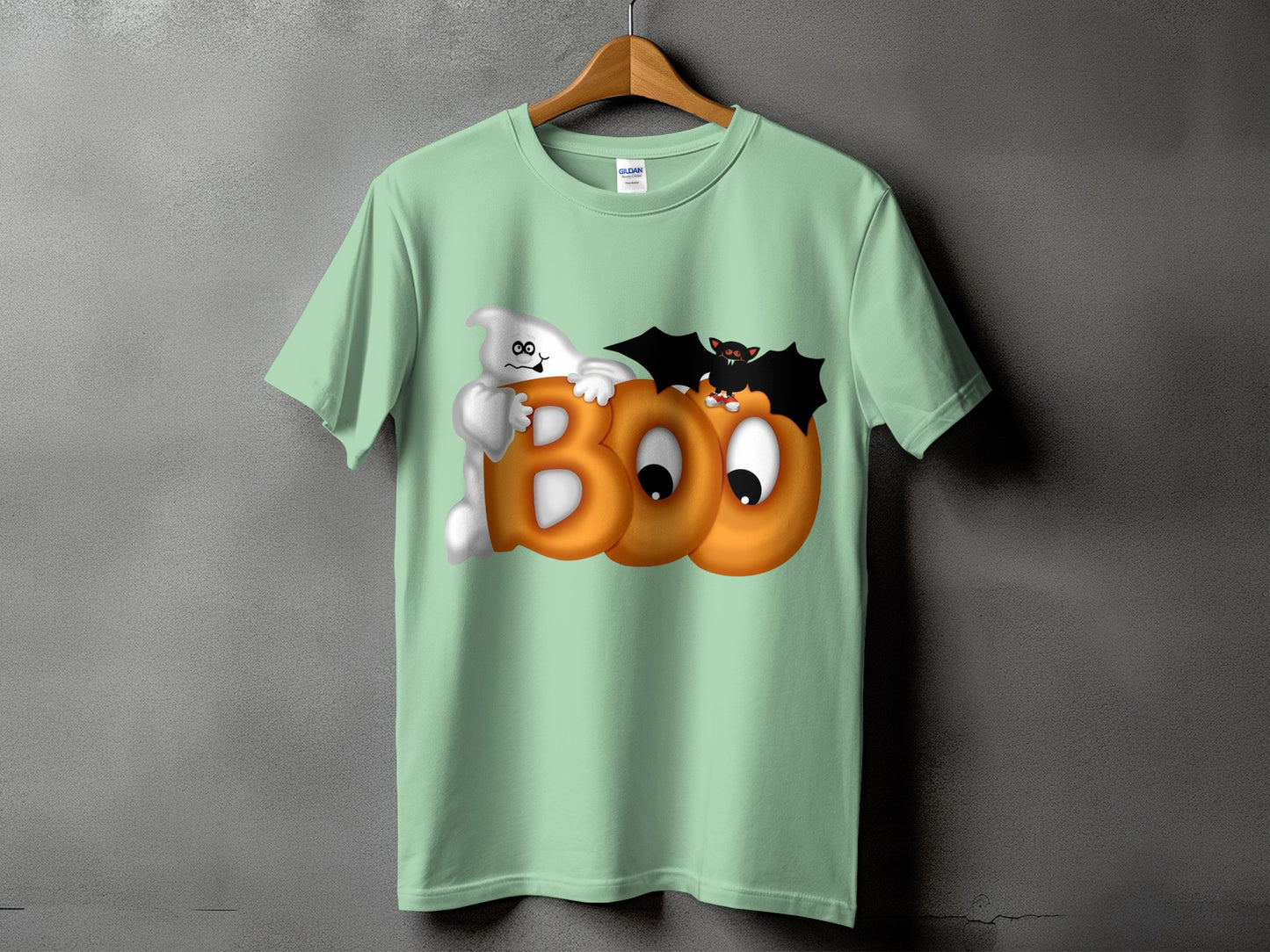 Mint green t-shirt with a "BOO" design featuring a ghost and bat.
