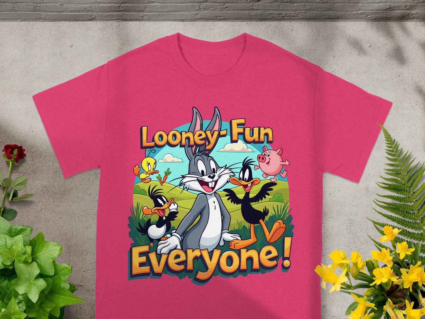 Pink t-shirt with "Looney Fun Everyone!" and Looney Tunes characters.
