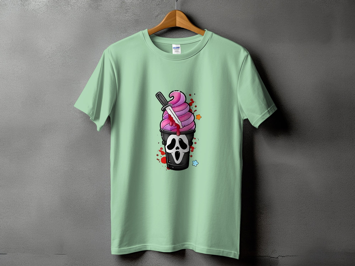 Light green t-shirt with a horror-themed ice cream graphic on the front.