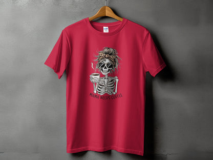 Red t-shirt with skeleton graphic holding coffee and text "MAMA NEEDS COFFEE."
