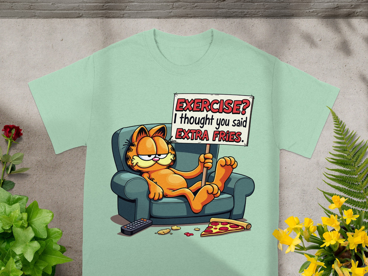 Garfield on couch holding sign "Exercise? I thought you said Extra Fries".