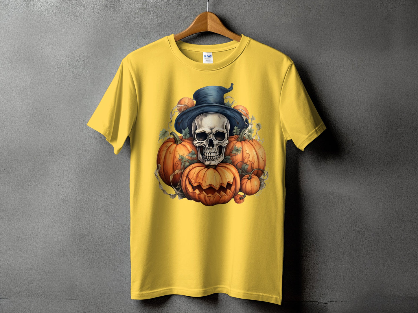 Yellow t-shirt with Halloween skull and pumpkins graphic.