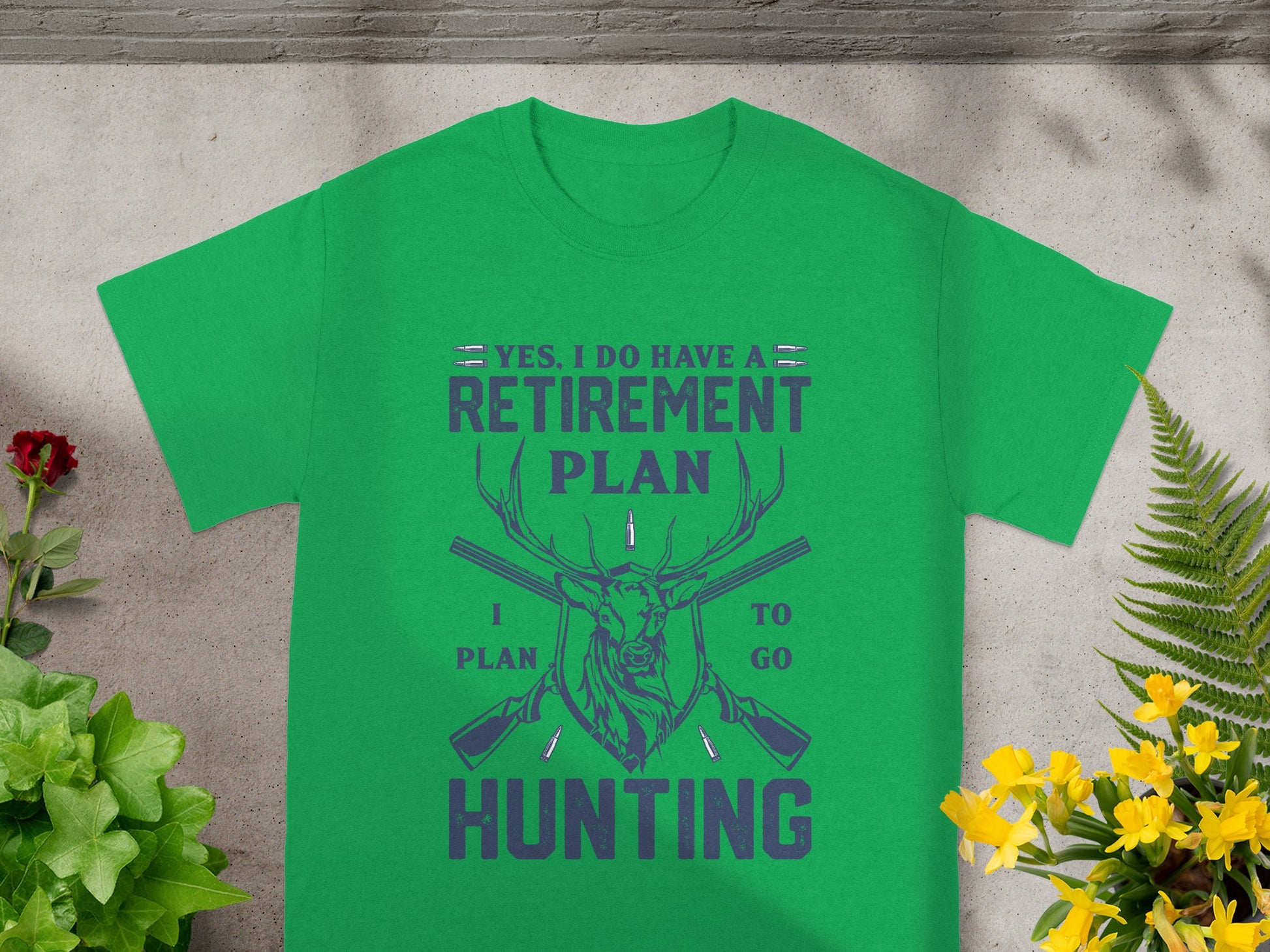 Green t-shirt with "My Retirement Plan: I Plan To Go Hunting" and deer graphic.