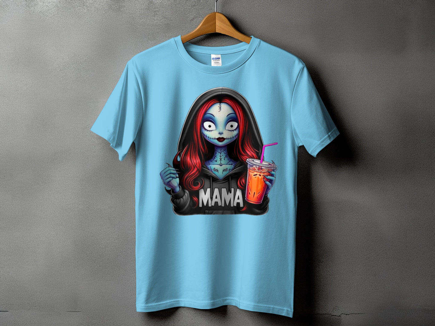 Light blue t-shirt with graphic of a skeleton-like woman holding a drink, text "MAMA".