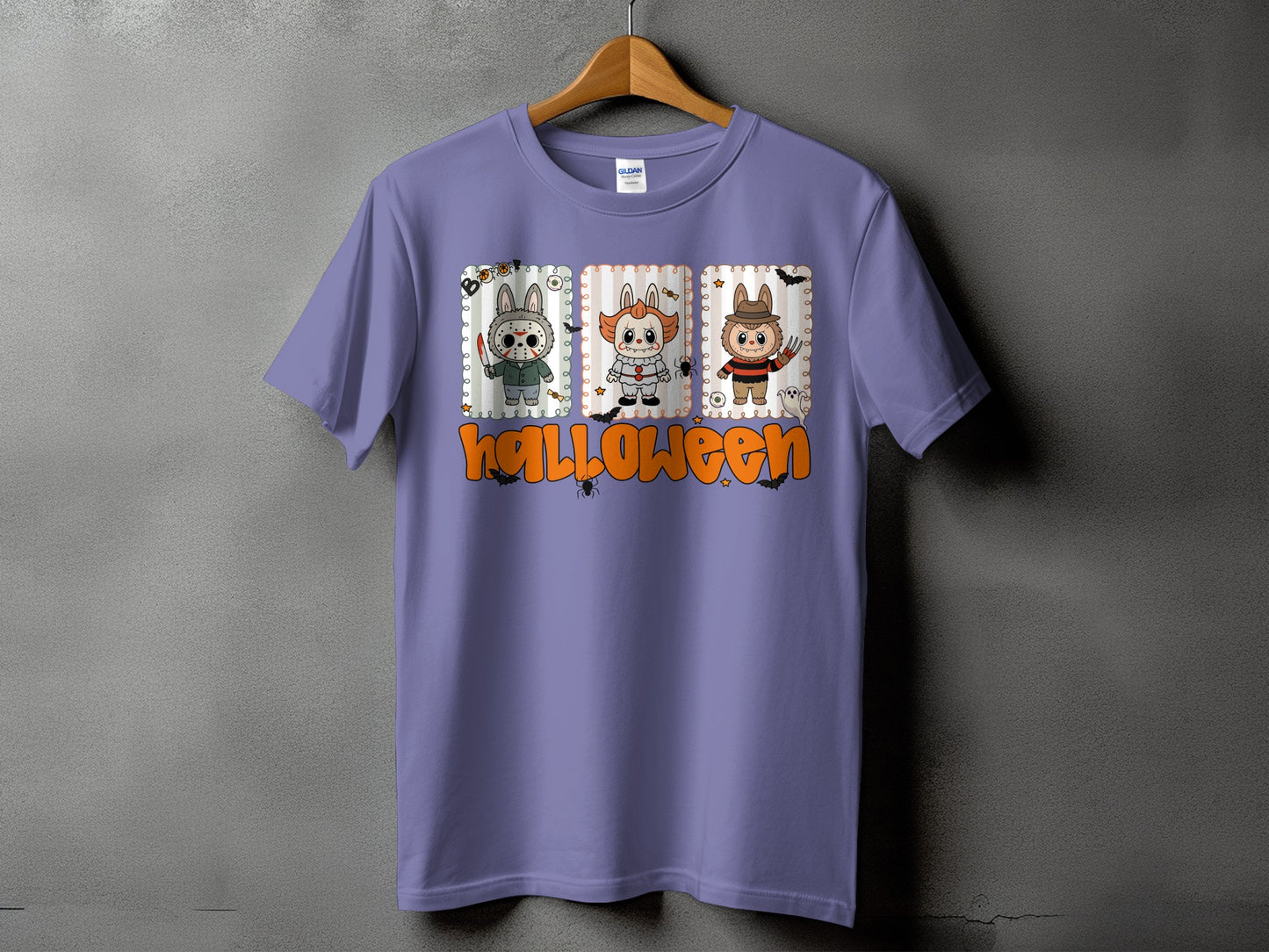 Purple t-shirt with cartoon Halloween characters and text.