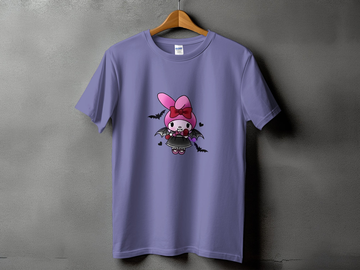 Purple t-shirt with a cartoon character dressed as a vampire, surrounded by bats.