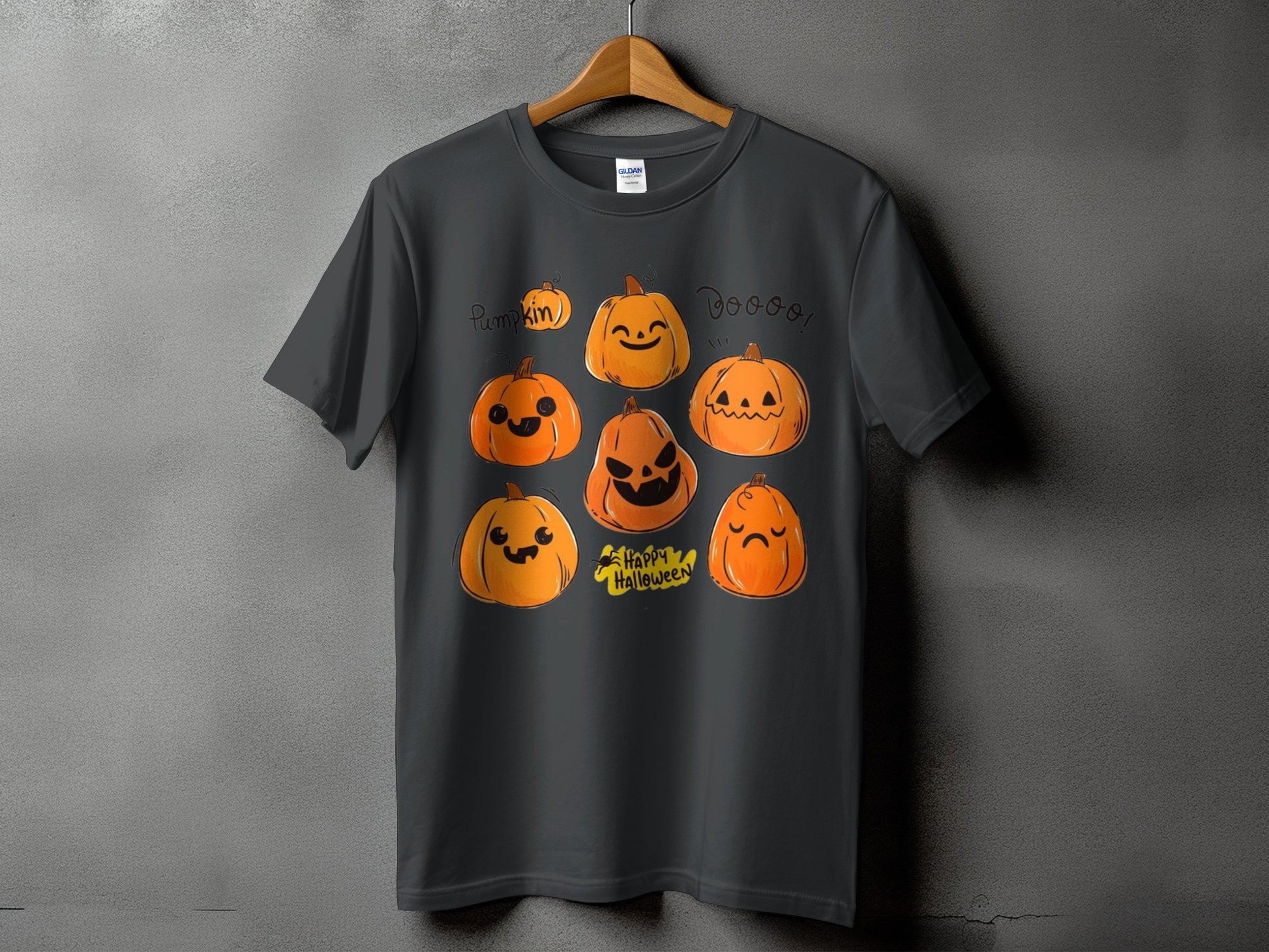 Dark grey t-shirt featuring a Halloween graphic with seven cartoon pumpkins and text.