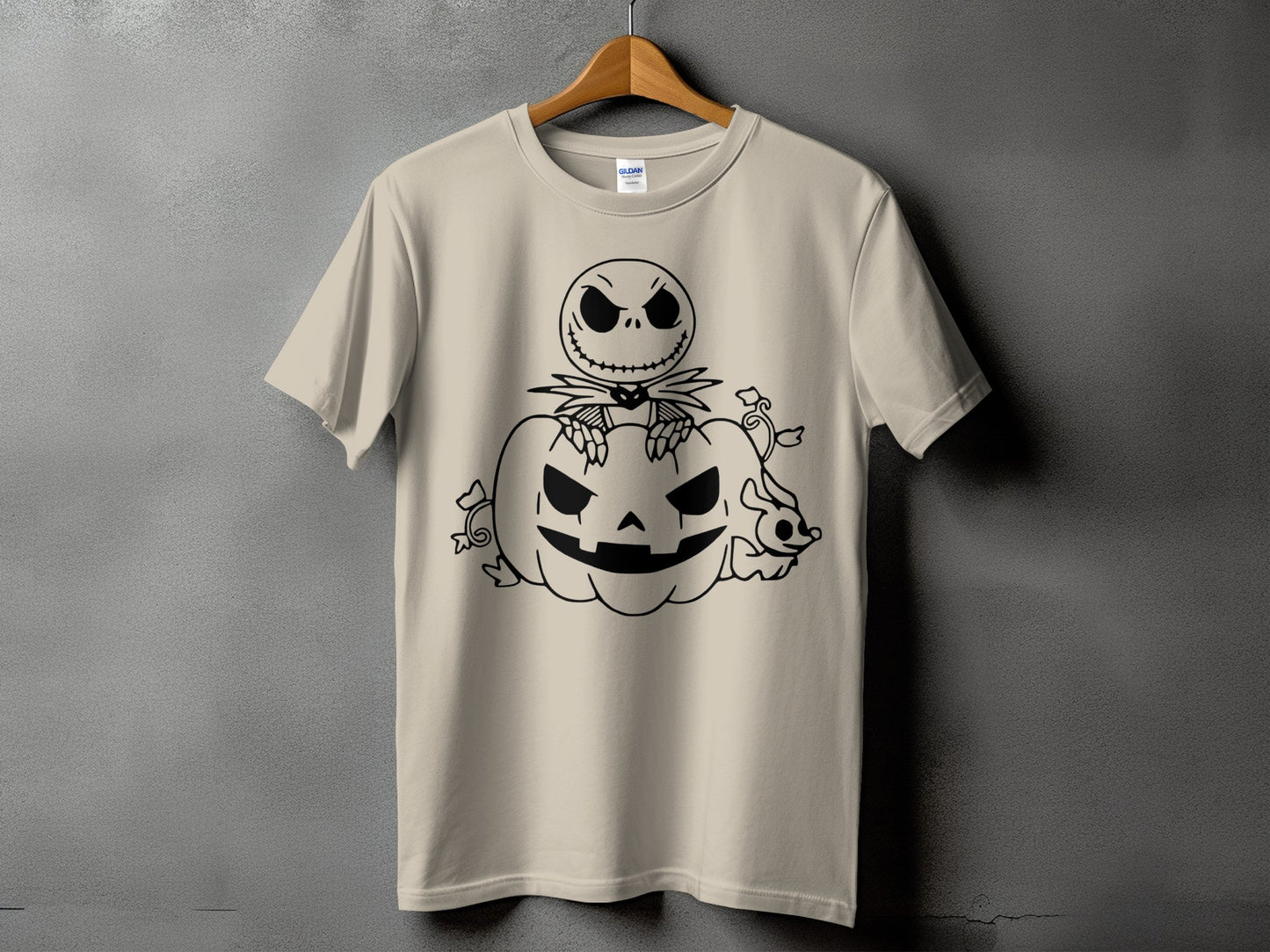 T-shirt with black outline of Jack Skellington sitting on a pumpkin.
