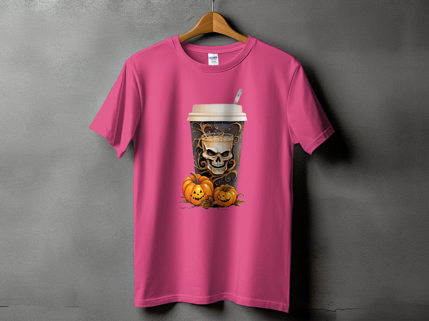 Pink t-shirt featuring a skull coffee cup and two jack-o'-lanterns.