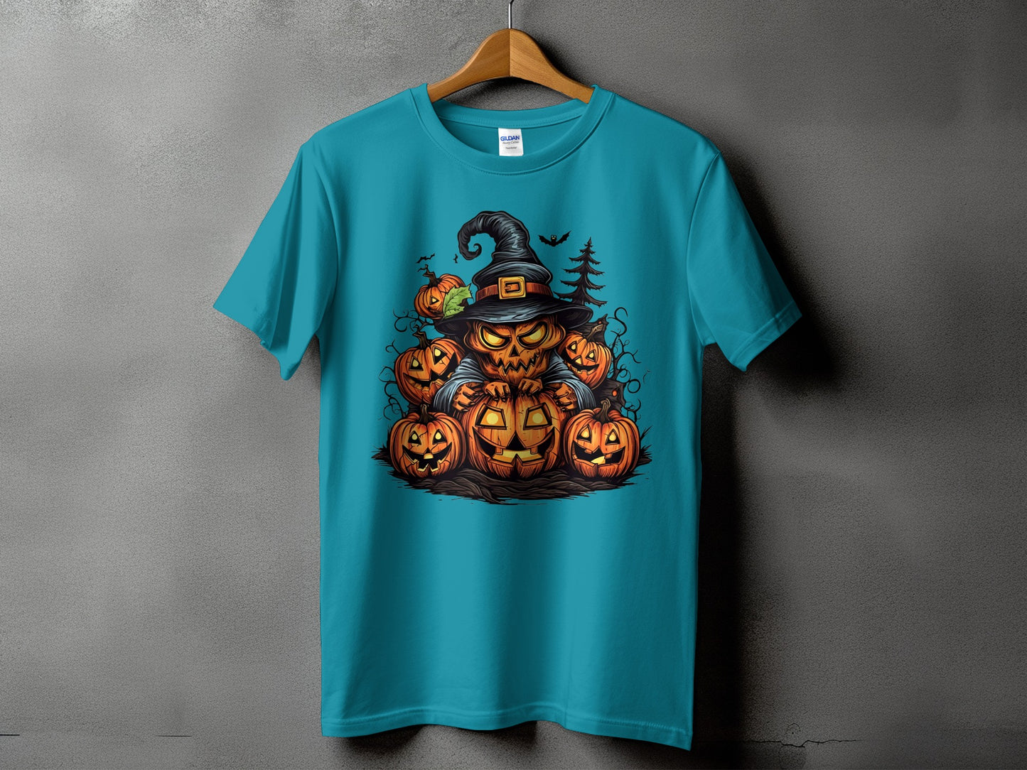 Teal t-shirt with a jack-o'-lantern and pumpkins Halloween graphic.