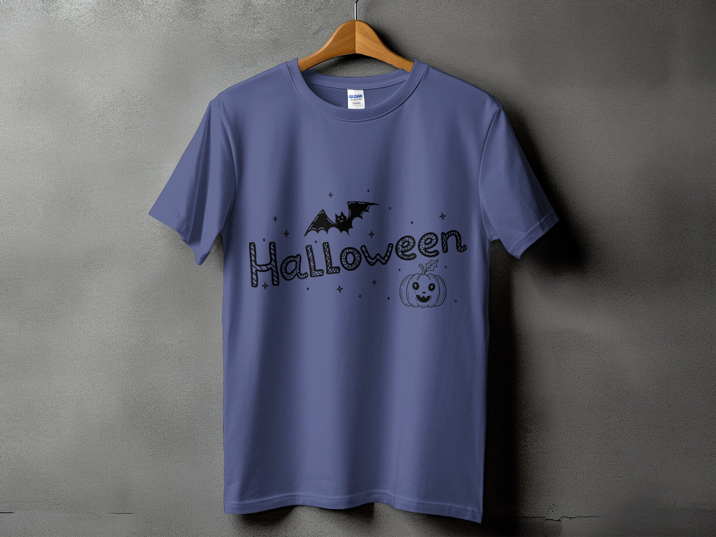 Purple t-shirt with black Halloween text, bat, and pumpkin design.