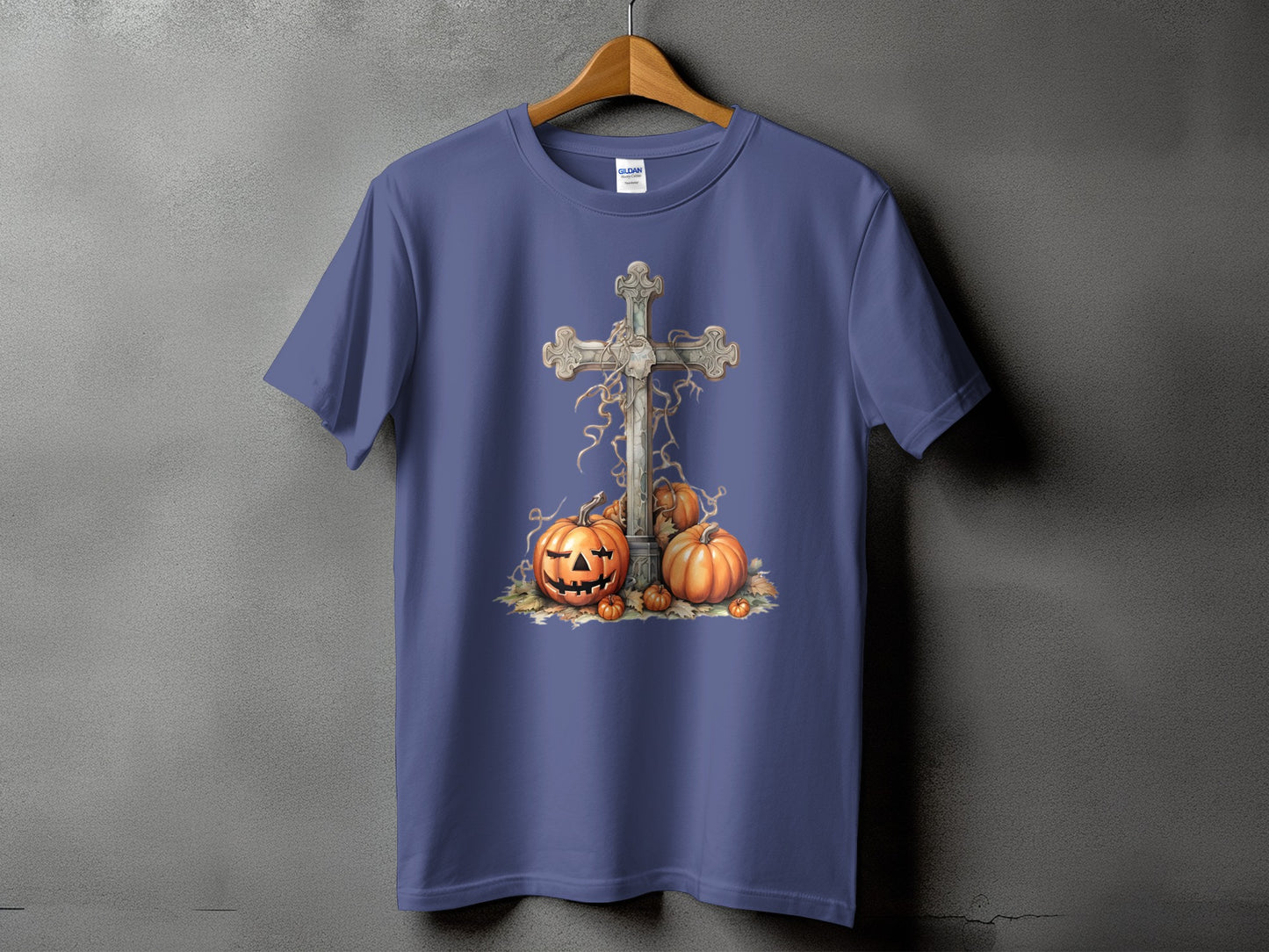Purple t-shirt with a distressed cross, jack-o'-lantern, and pumpkins graphic.