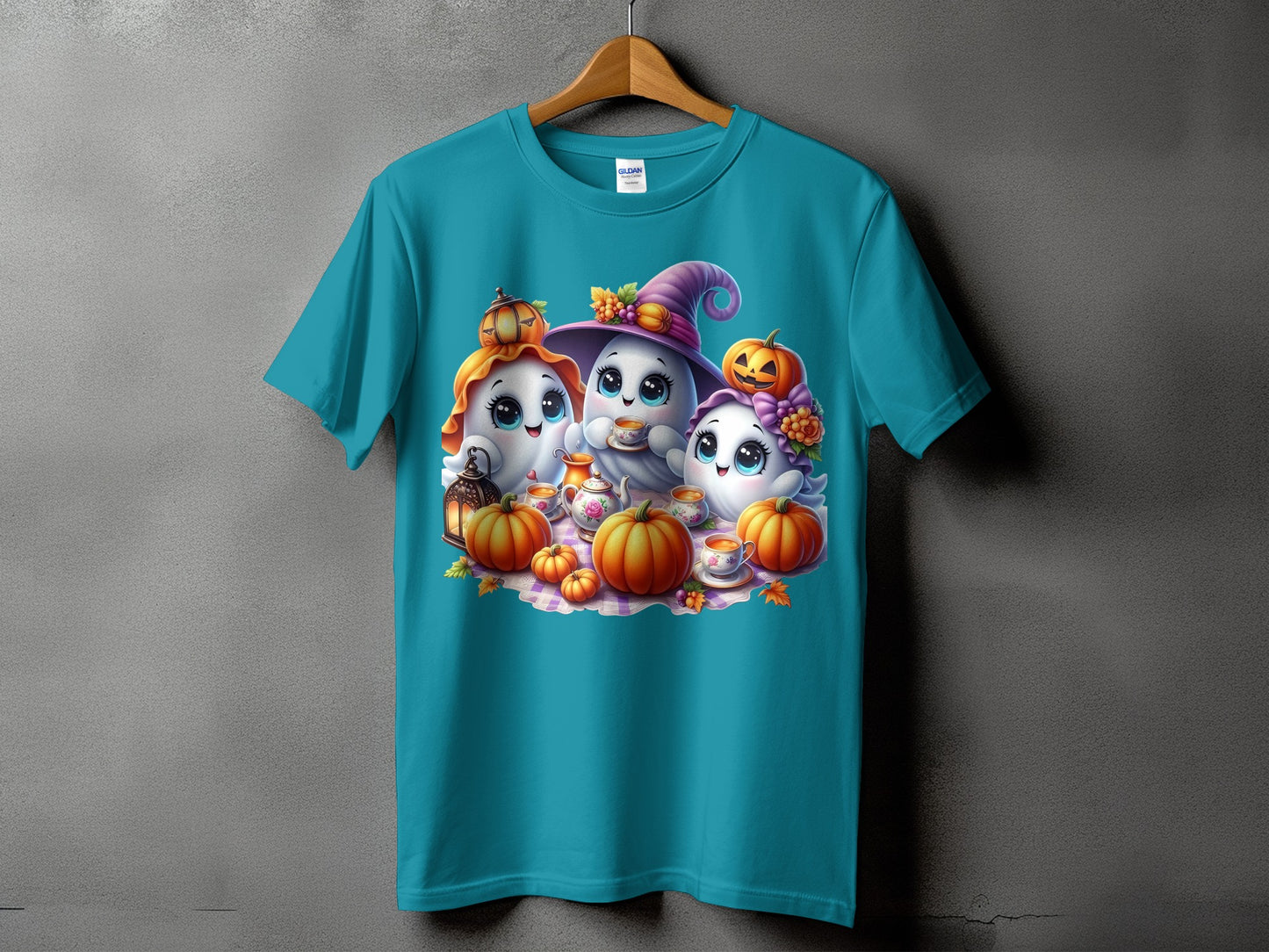 Three cute ghosts in Halloween hats with pumpkins and tea set on a plaid blanket.