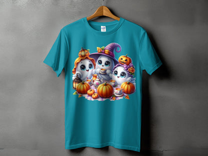 Three cute ghosts in Halloween hats with pumpkins and tea set on a plaid blanket.