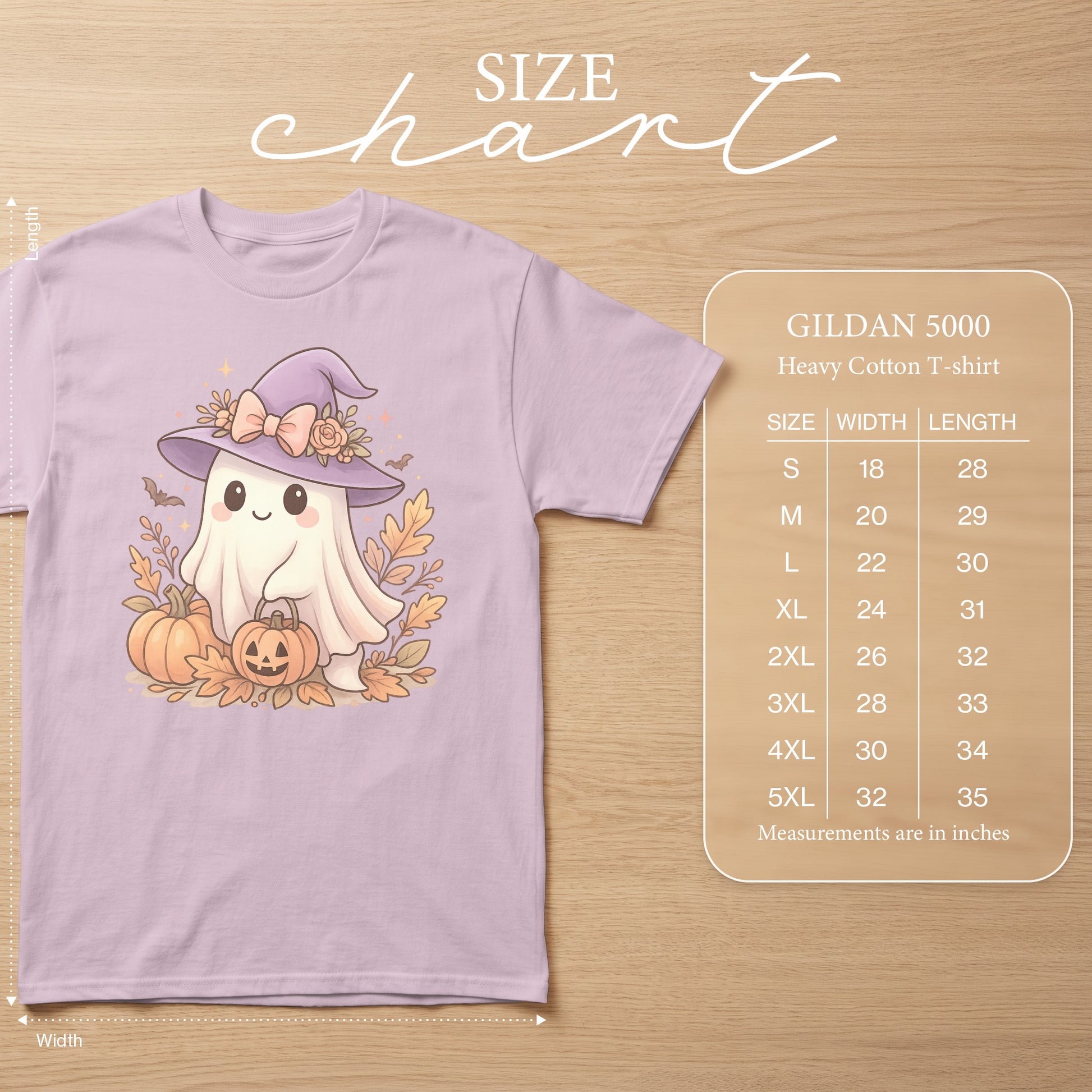 Purple t-shirt with a kawaii ghost wearing a witch hat, pumpkins, and autumn leaves. Includes size chart.