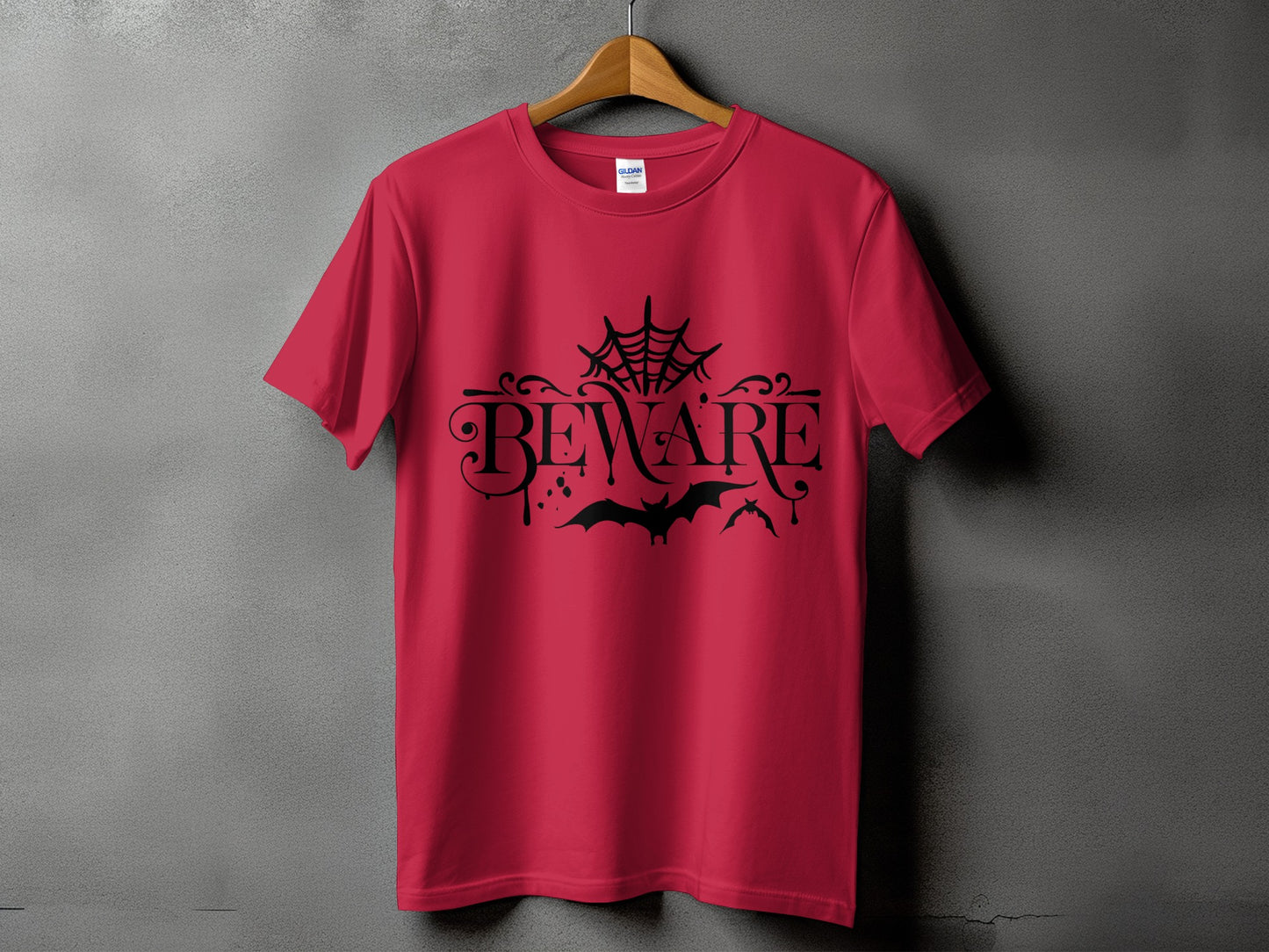 Red t-shirt with black "BEWARE" text, bats, and spiderweb graphic.