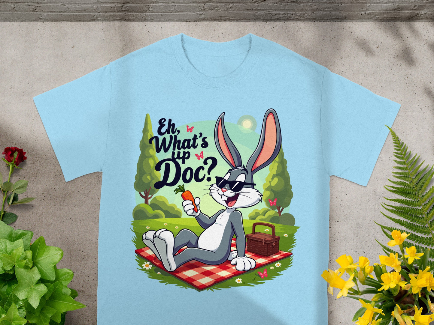 Bugs Bunny with sunglasses and carrot on a picnic blanket, with text "Eh, What's Up Doc?".