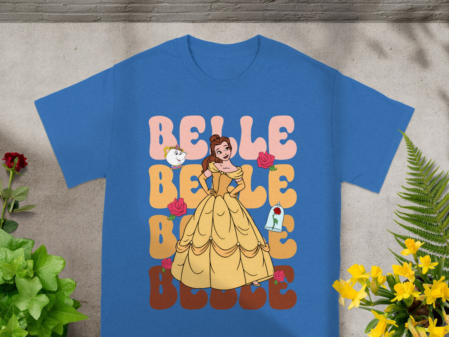 Belle from Beauty and the Beast on a blue t-shirt with "Belle" text.
