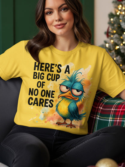 Yellow t-shirt with grumpy blue bird saying "Here's a big cup of no one cares".