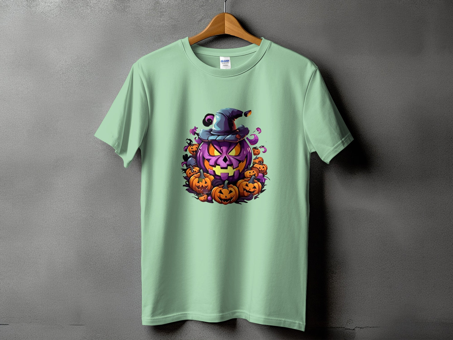 Green t-shirt with a large purple jack-o'-lantern and surrounding pumpkins design.