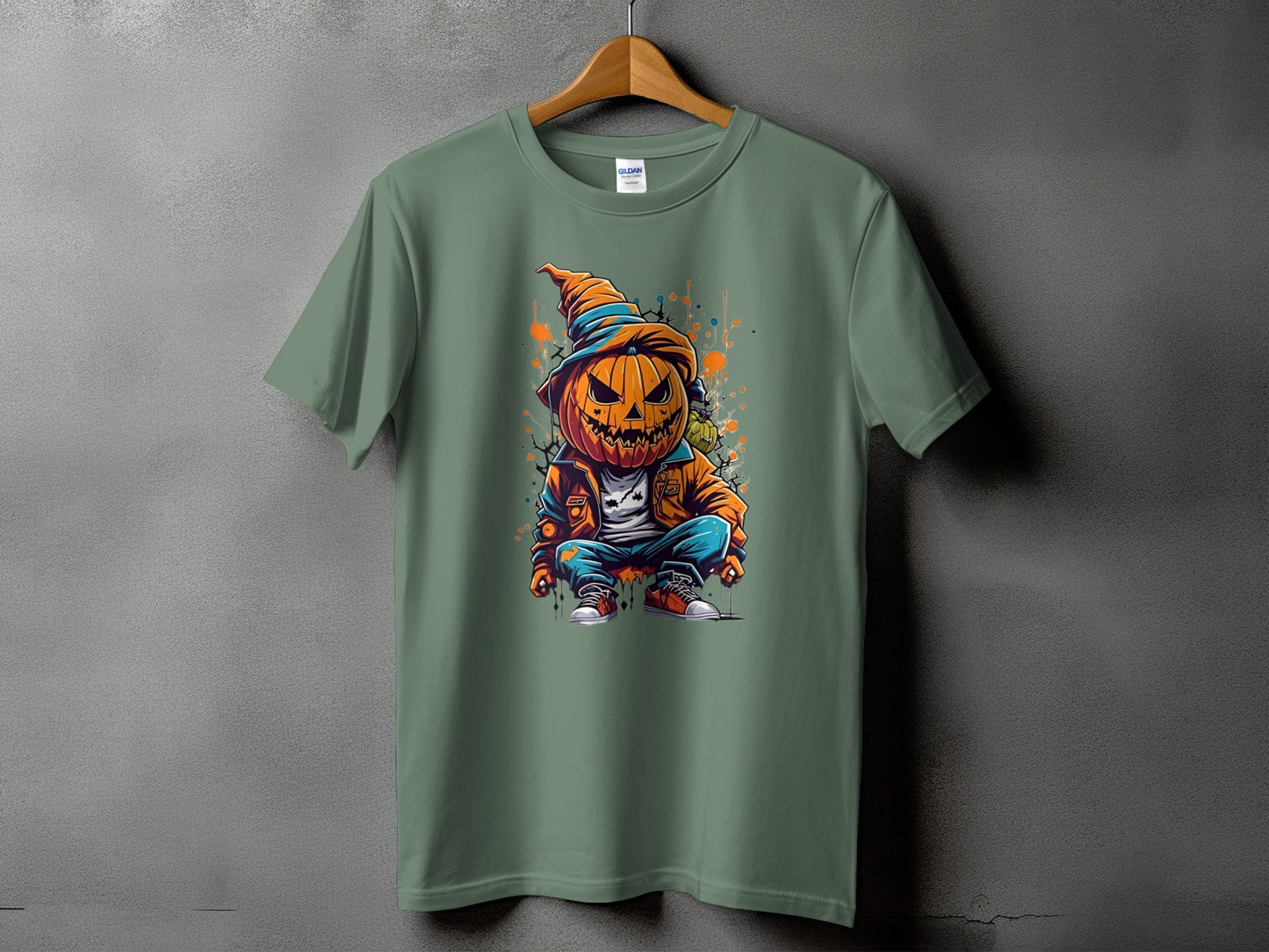 Green t-shirt with cartoon jack-o'-lantern wearing a hat and jacket.
