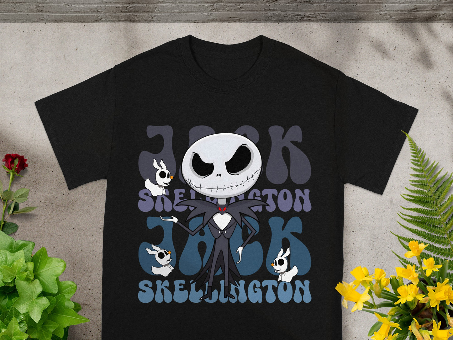 Black t-shirt with Jack Skellington graphic and text.