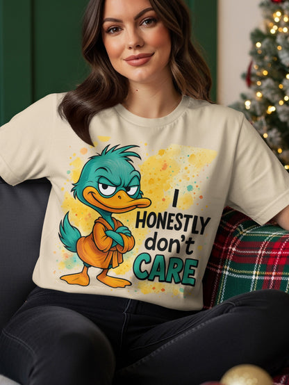 Cream t-shirt with cartoon duck and text "I HONESTLY DON'T CARE".