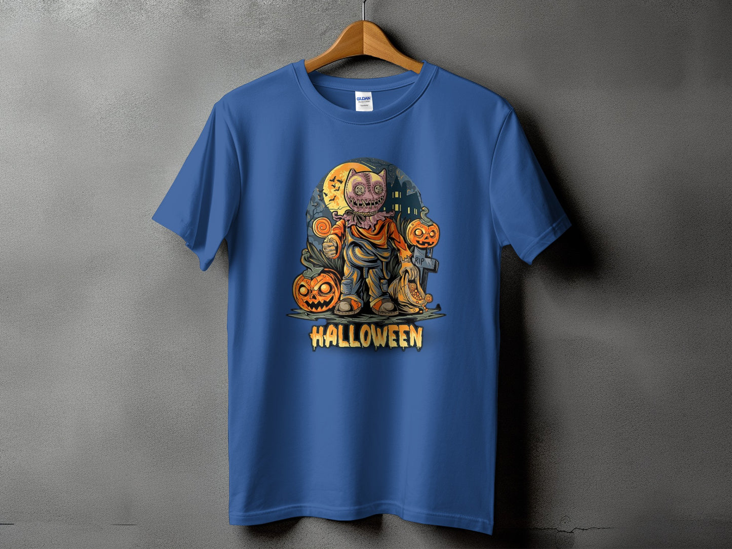 Blue t-shirt with a cartoon scarecrow, pumpkins, and the word "HALLOWEEN."