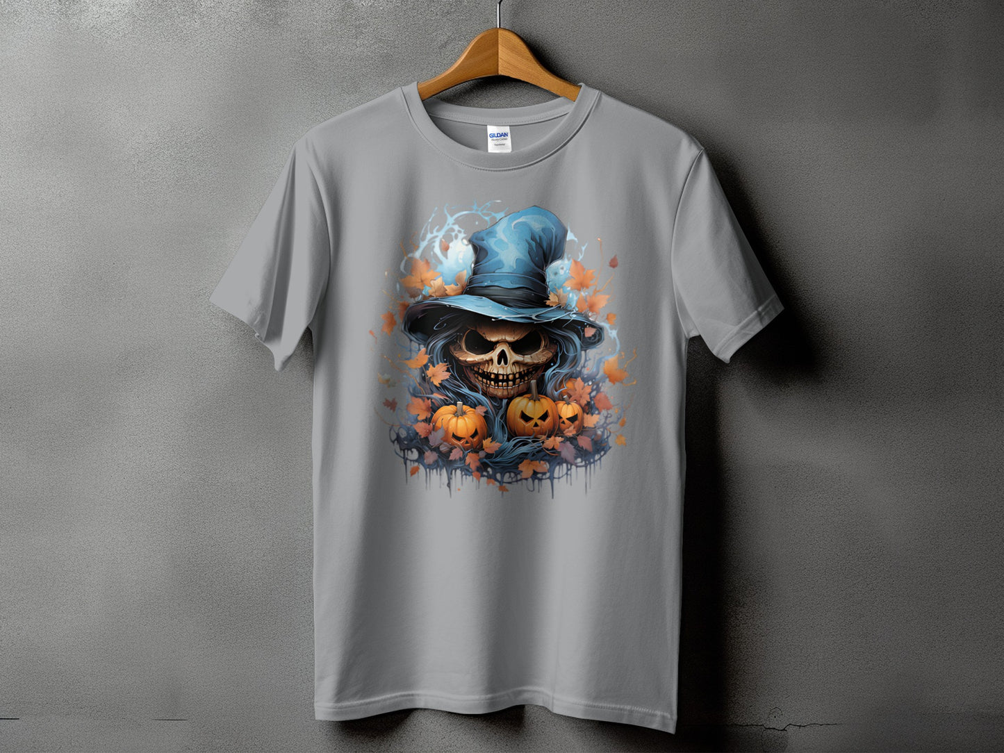 Gray t-shirt with a Halloween skull, pumpkins, and autumn leaves graphic.