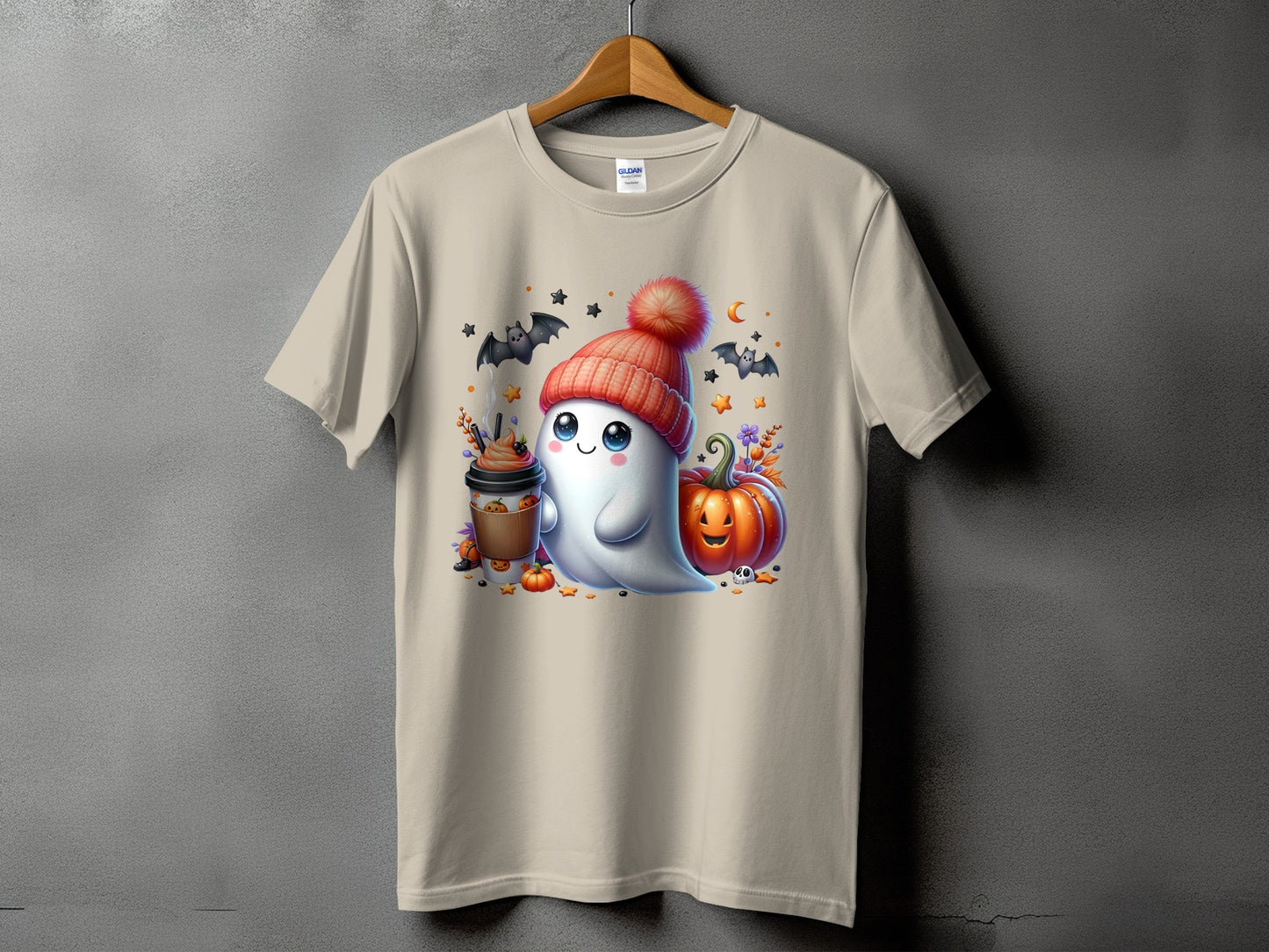 Cream t-shirt with ghost, coffee, pumpkin, bats, and stars Halloween graphic.