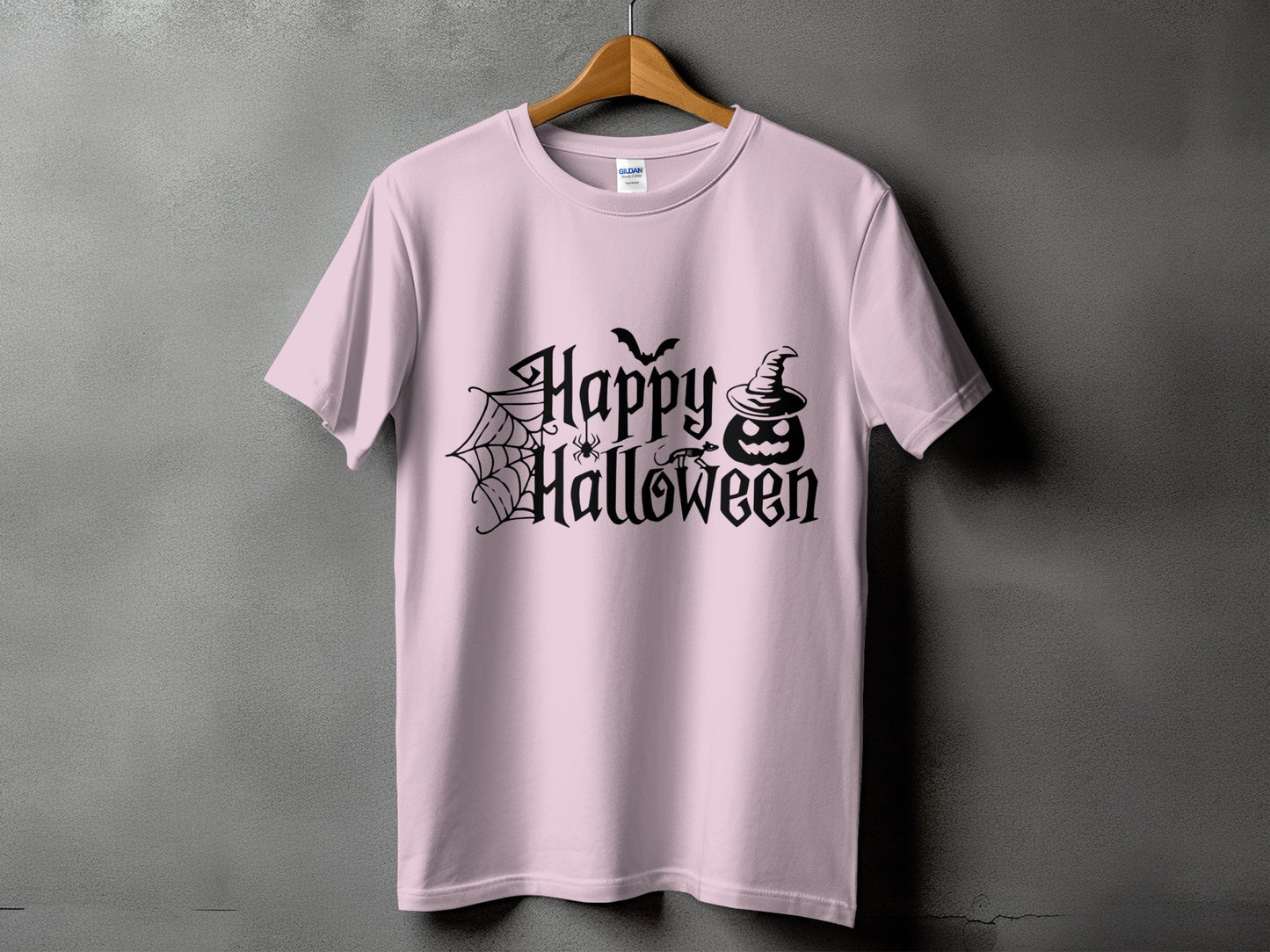 Pink t-shirt with black "Happy Halloween" text, bat, spider, and pumpkin.