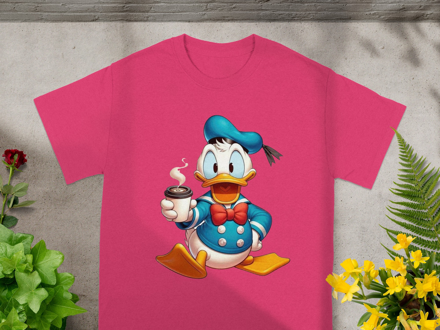 Donald Duck in sailor outfit holding coffee cup on a pink t-shirt.