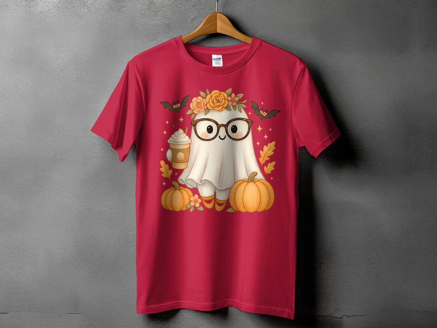 Red t-shirt with a cute ghost graphic wearing glasses and a flower crown, holding a coffee.