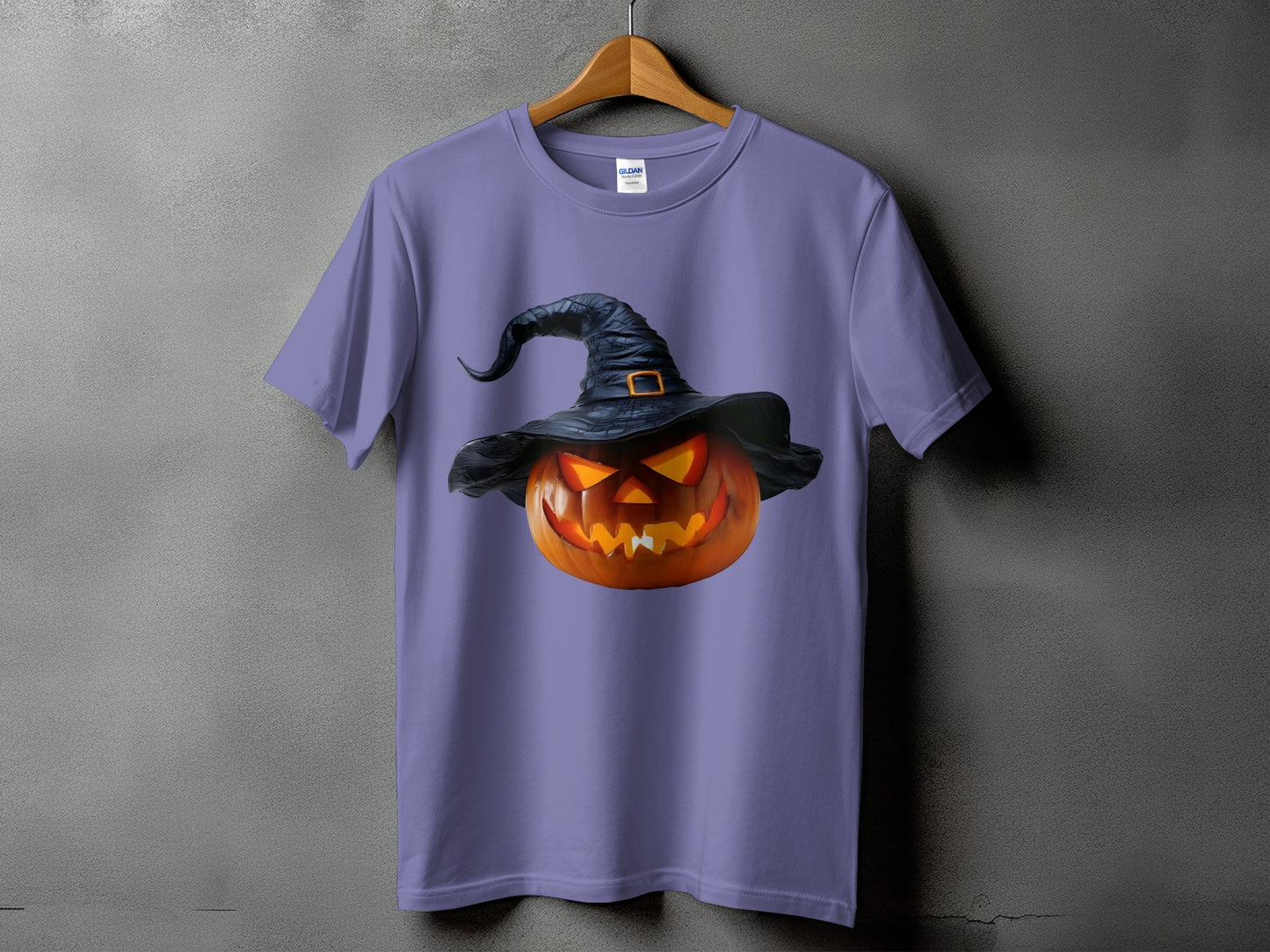 Purple t-shirt with a jack-o'-lantern wearing a witch hat graphic.