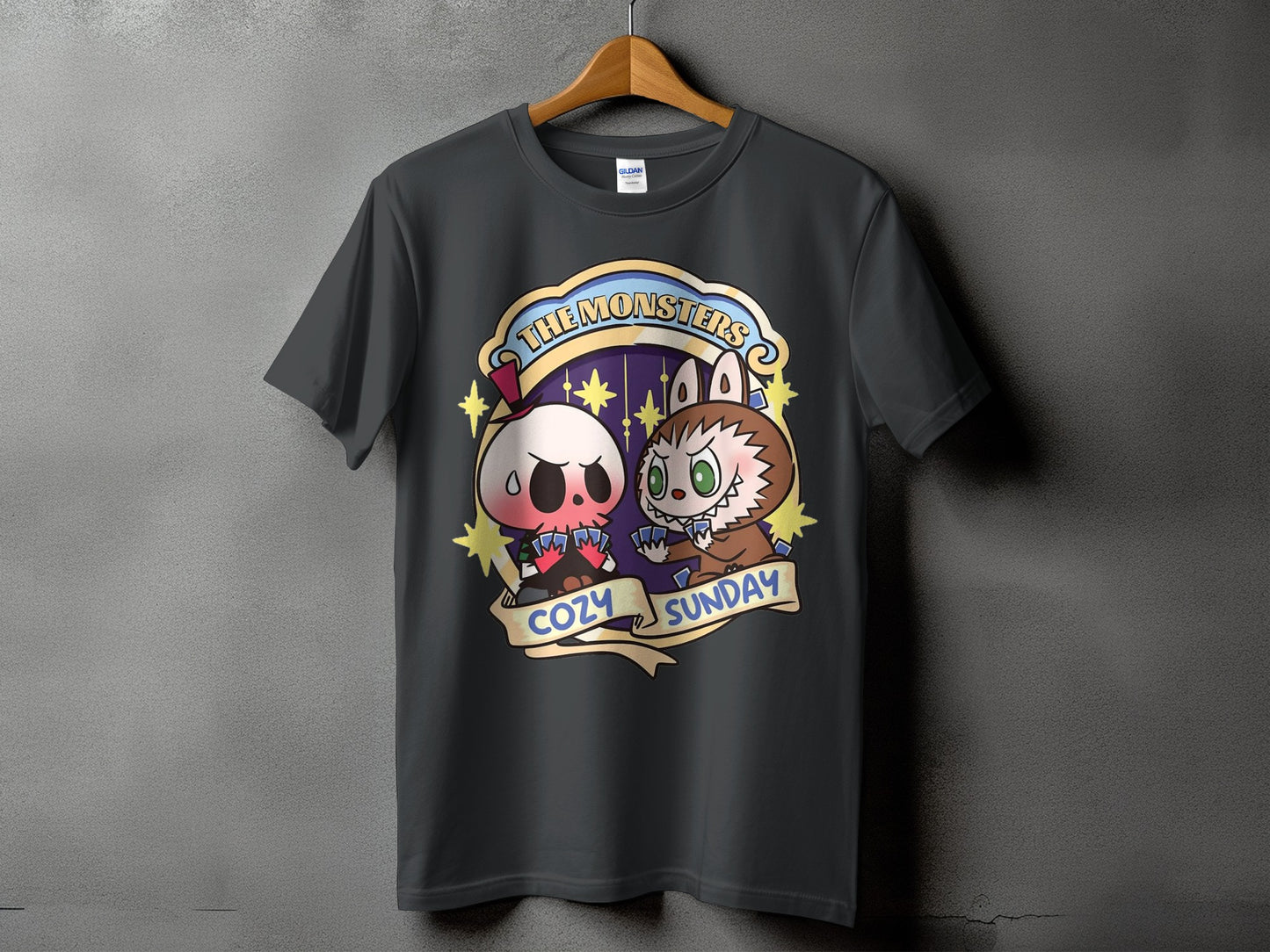 Dark gray t-shirt featuring cartoon skull and werewolf characters with "The Monsters Cozy Sunday" text.