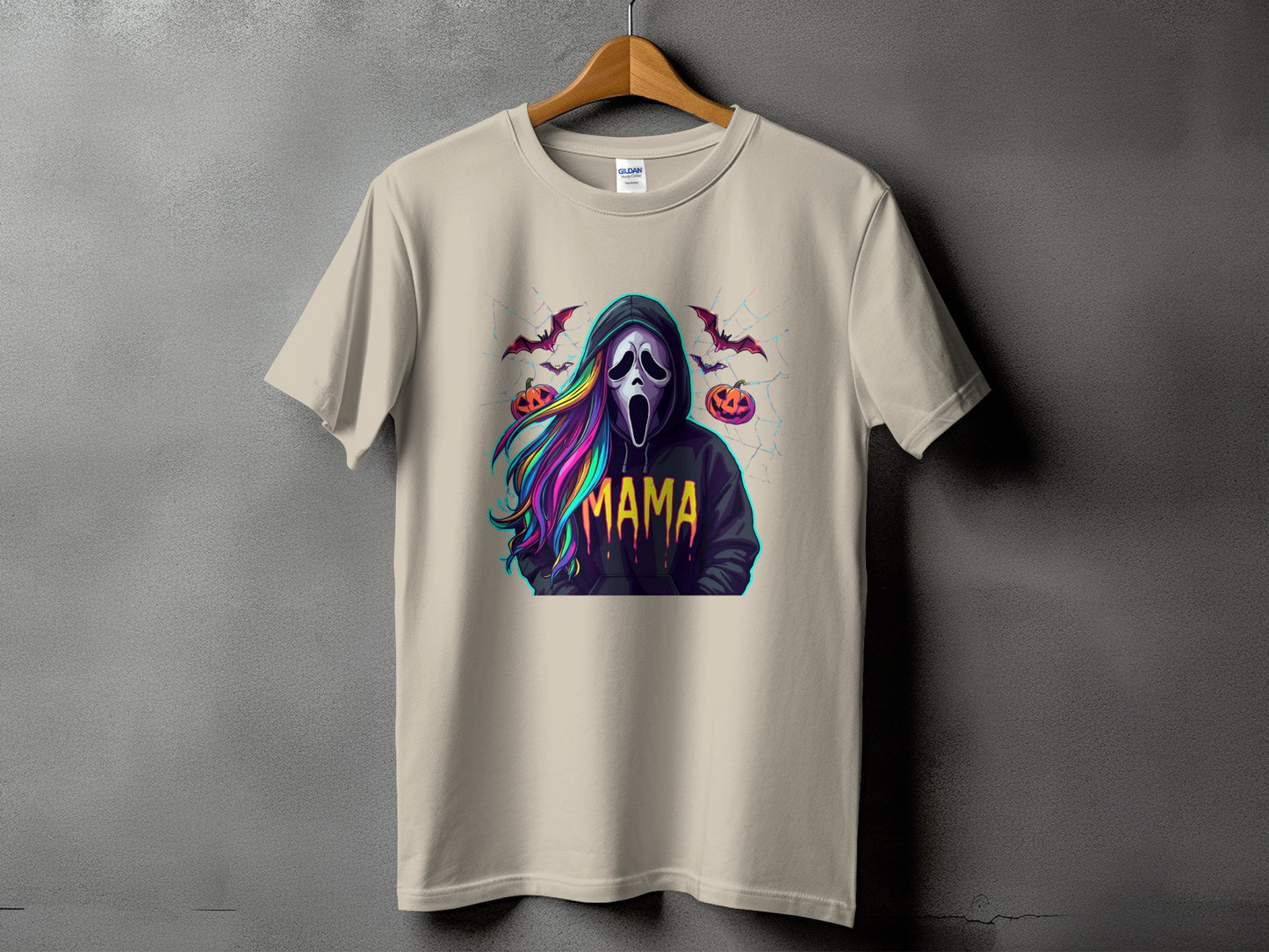 T-shirt with a ghost mask, rainbow hair, bats, and "MAMA" text.