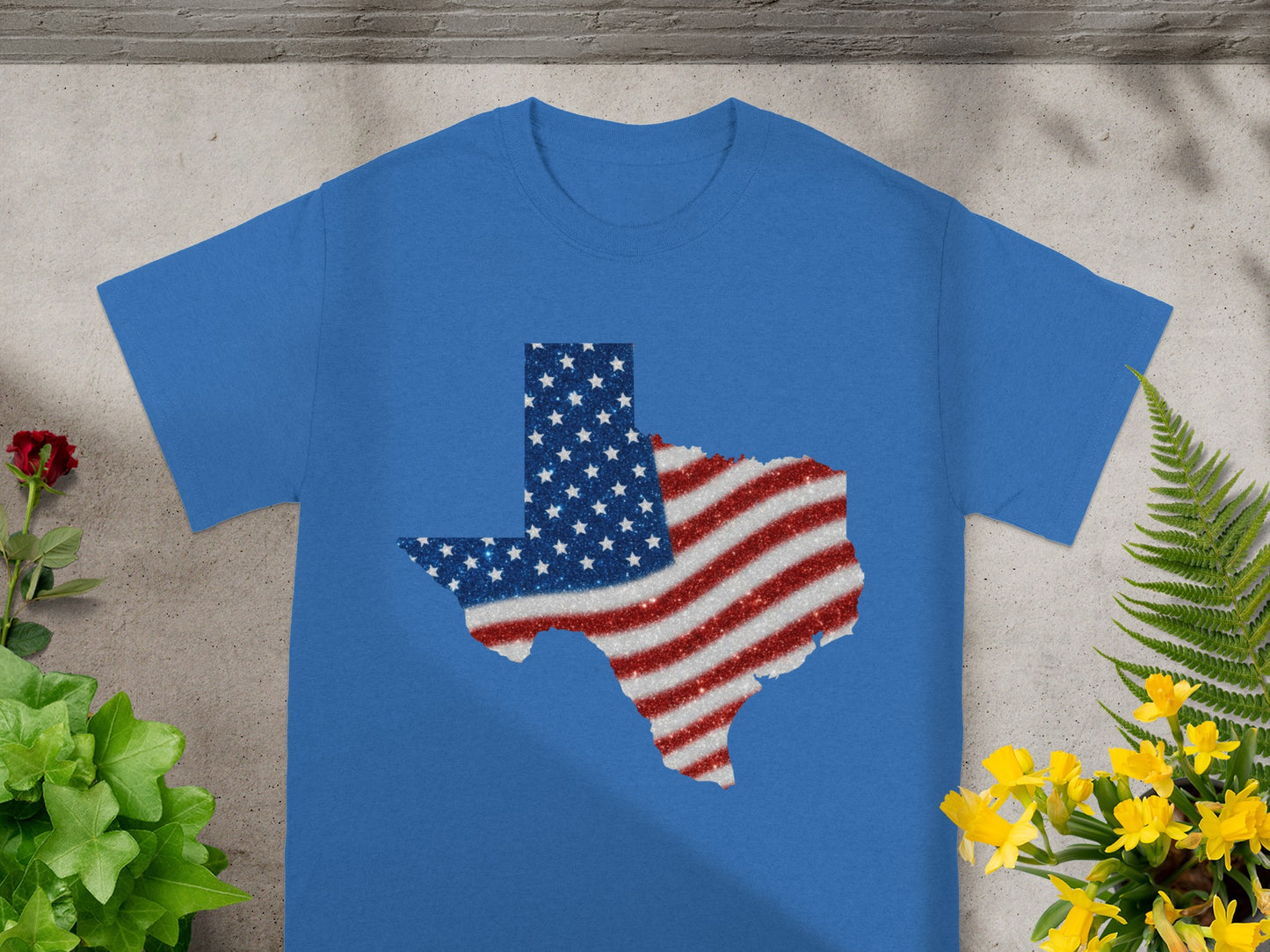 Blue t-shirt with a glitter Texas flag design.