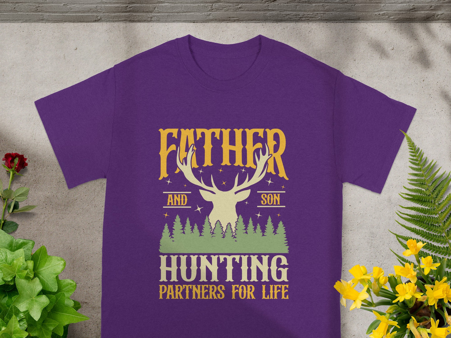 Purple t-shirt with "Father and Son Hunting Partners for Life" text and deer graphic.