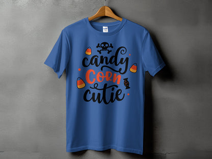 Blue t-shirt with "candy corn cutie" text and Halloween graphics.